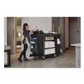 Janitorial & Housekeeping Carts | Rubbermaid Commercial 2202527 24.4 in. x 62.4 in. x 49 in. Full-Size 3-Shelf Resin Housekeeping Cart with Accessory Bundle - Black image number 3