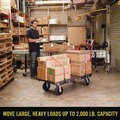 Carts & Trucks | Rubbermaid Commercial FG444100BLA 24 in. x 48 in. x 7 in. 2000 lbs. Capacity Platform Truck - Black image number 4